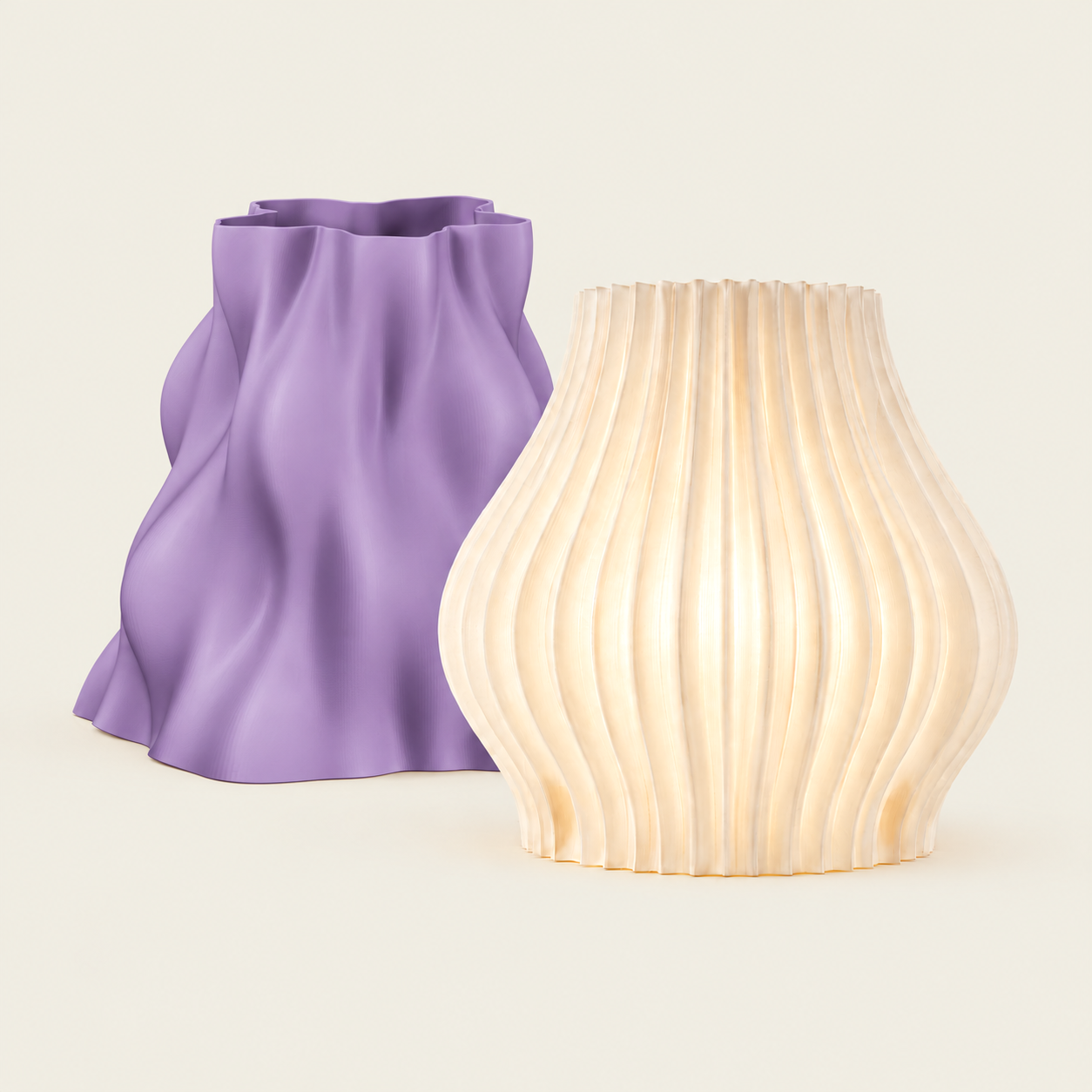 Sculptural lampshades in violet and warm illuminated white